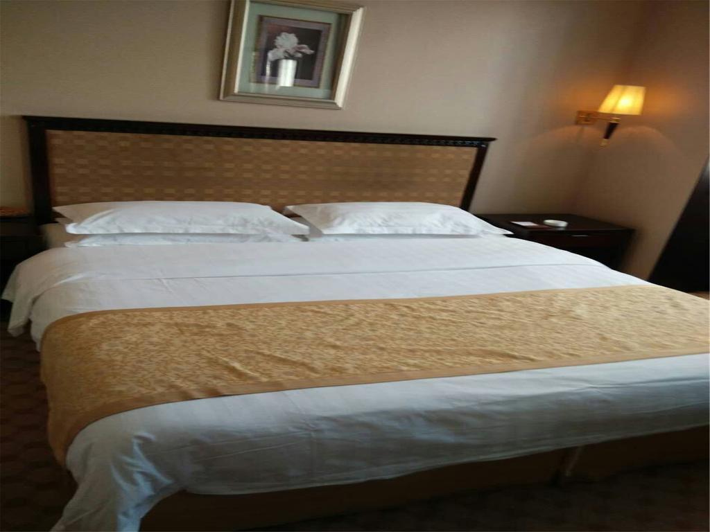 Datong Hongqi Grand Hotel Quarto foto