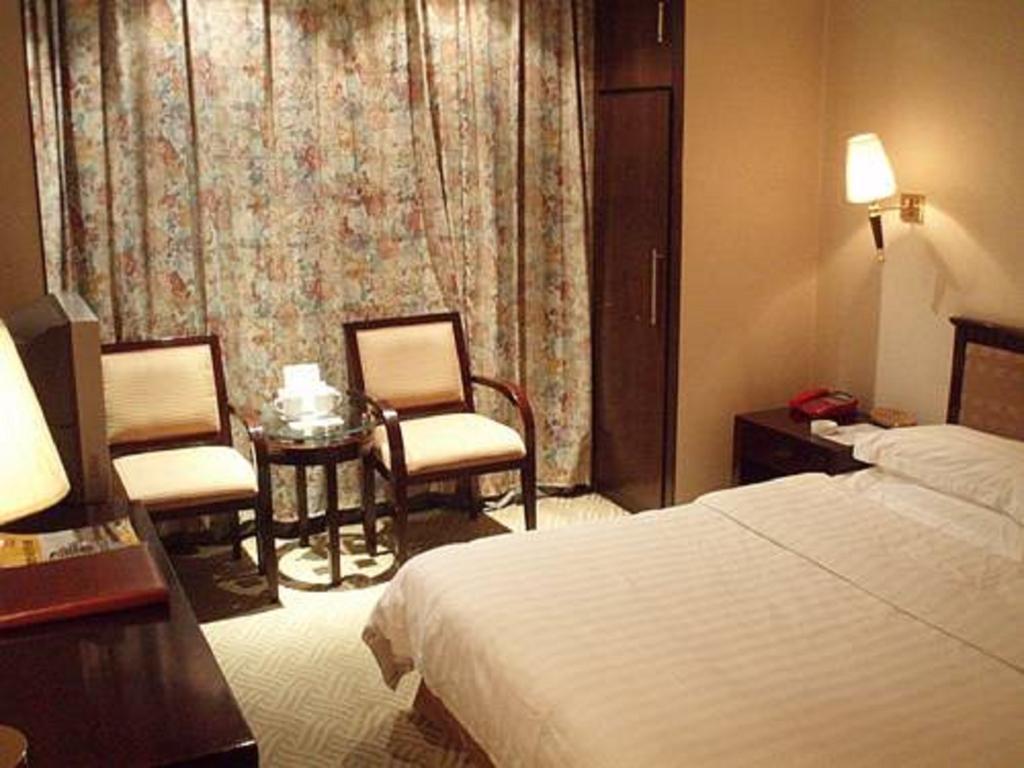 Datong Hongqi Grand Hotel Quarto foto